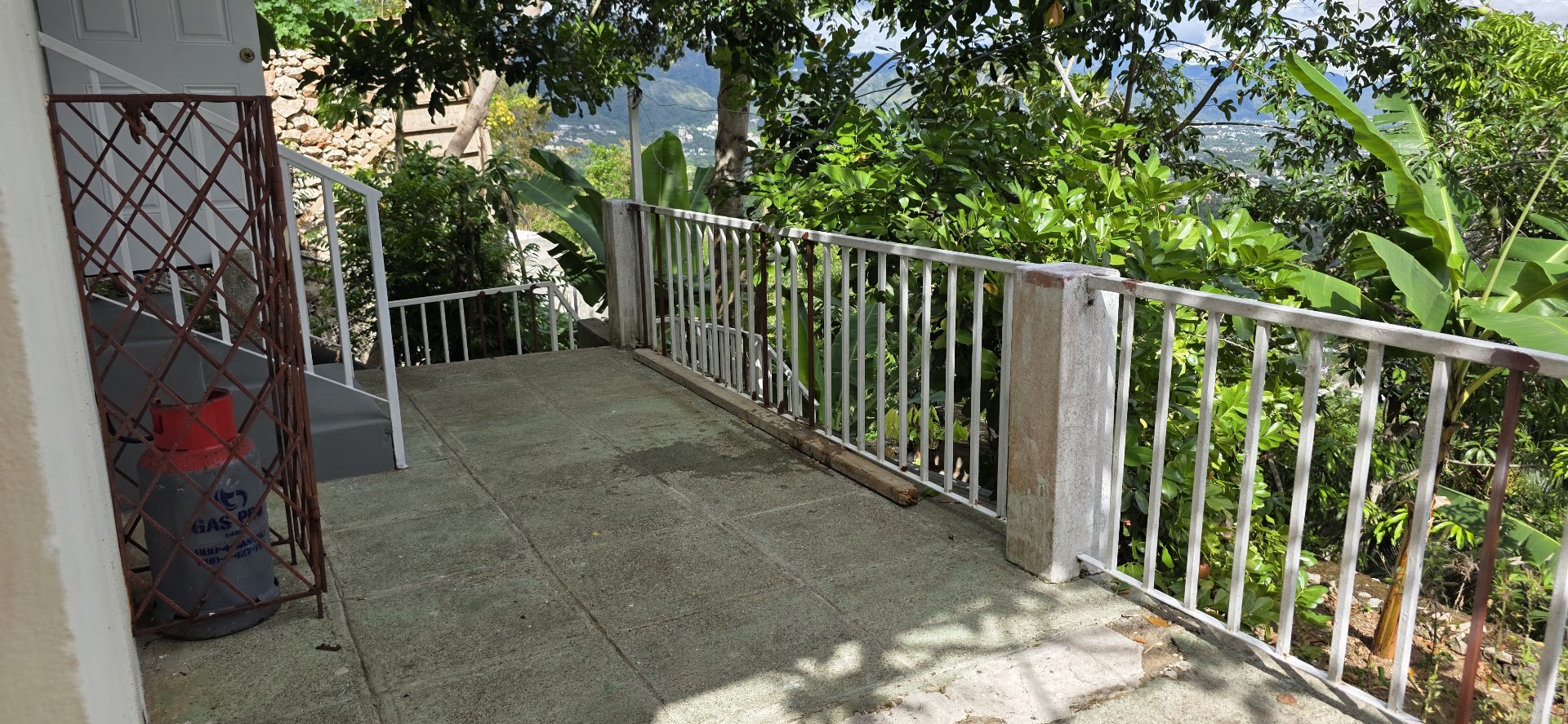1 Bedroom with City Views Downstairs Balcony/Clothes Line
